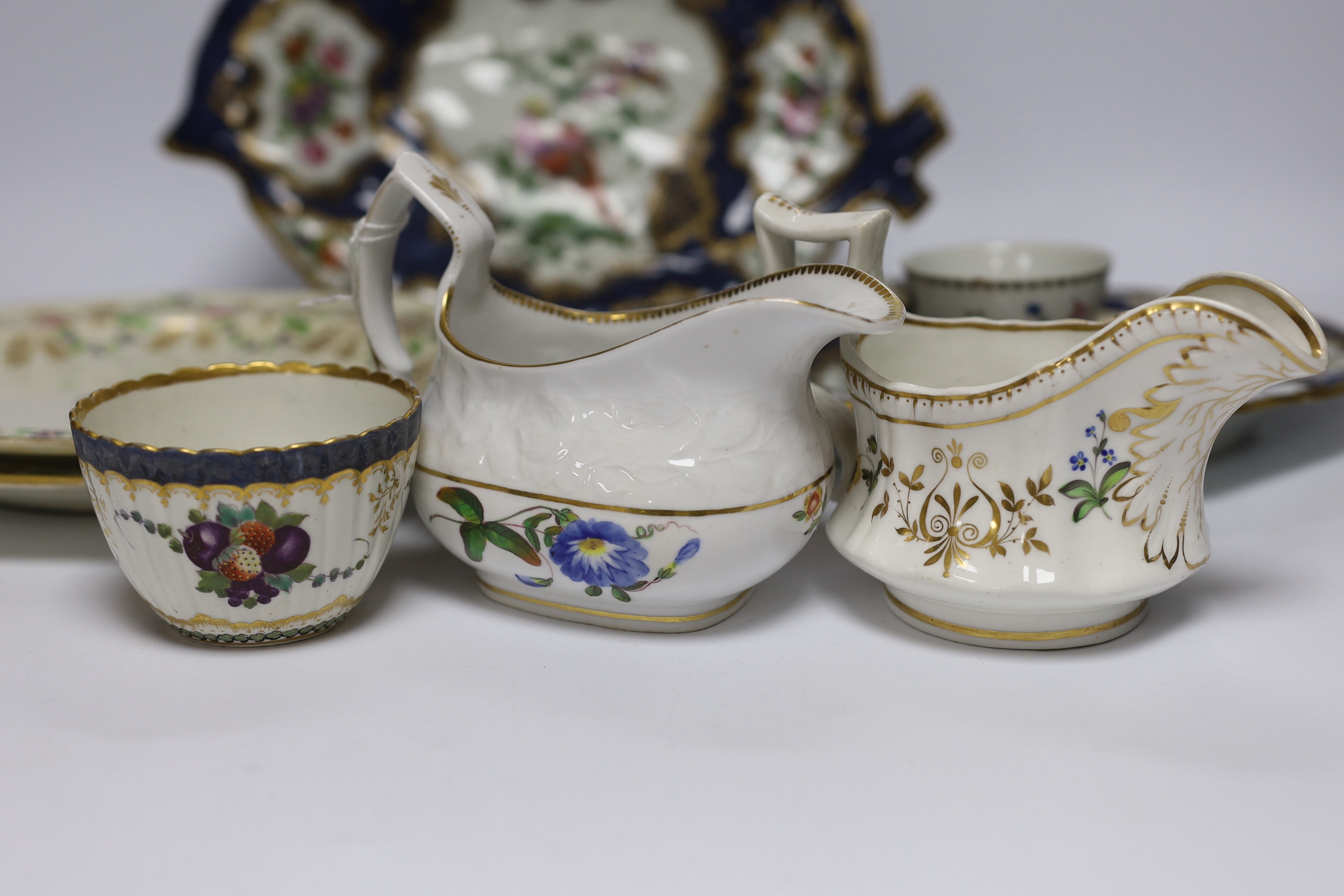 A pair of Samson Worcester style scale blue dishes, a Worcester fruit painted tea bowl and saucer, c.1780 and another teabowl together with a pair of Derby armorial plates, c.1820 and two jugs